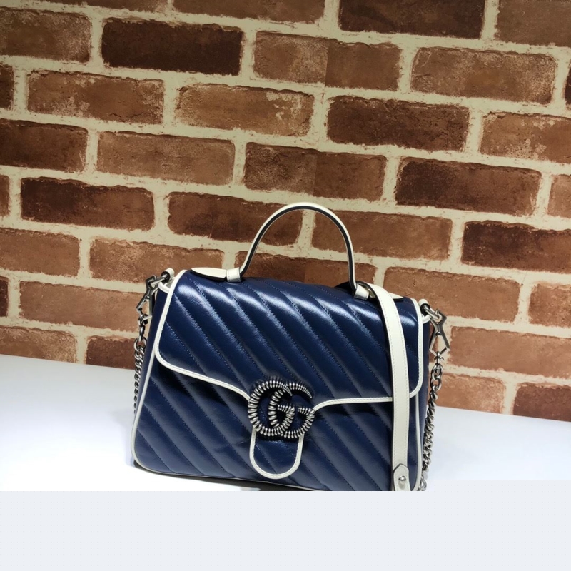 G*u*i top handle bags